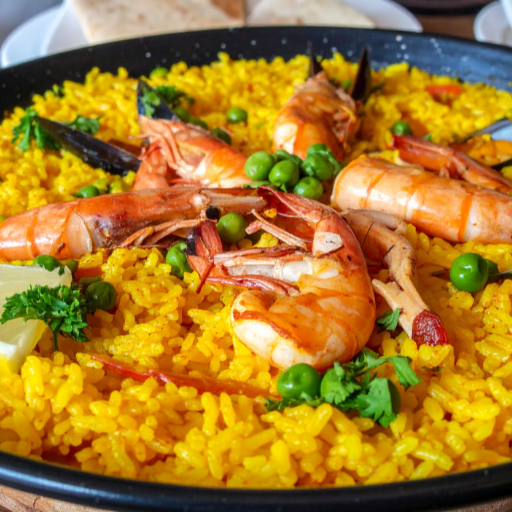 Paella Valenciana - Kulinarische Spezialität